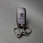 کاور ریموت پژو 405 و پارس کلید تاشو دو دکمه بدون بند دور فلزی وسط چرم - Image 12