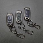 کاور ریموت پژو 405 و پارس کلید تاشو دو دکمه بدون بند دور فلزی وسط چرم