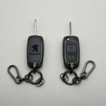 کاور ریموت پژو 405 و پارس کلید تاشو دو دکمه بدون بند دور فلزی وسط چرم - Image 3