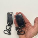 کاور ریموت سمند کلید تاشو سه دکمه دور فلزی وسط چرم - Image 6