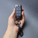 کاور ریموت سمند کلید تاشو سه دکمه دور فلزی وسط چرم - Image 11