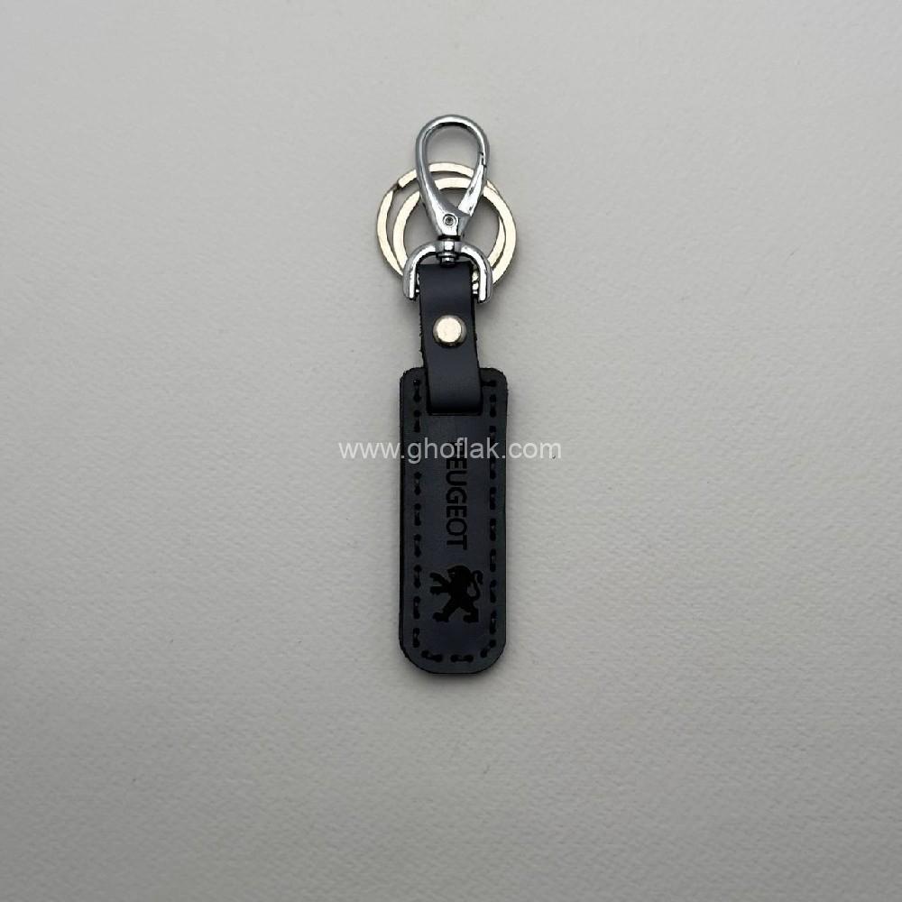 photo_2024-09-27_12-22-35 آویز کلید چرم ماشینی مارک پژو - Image 1