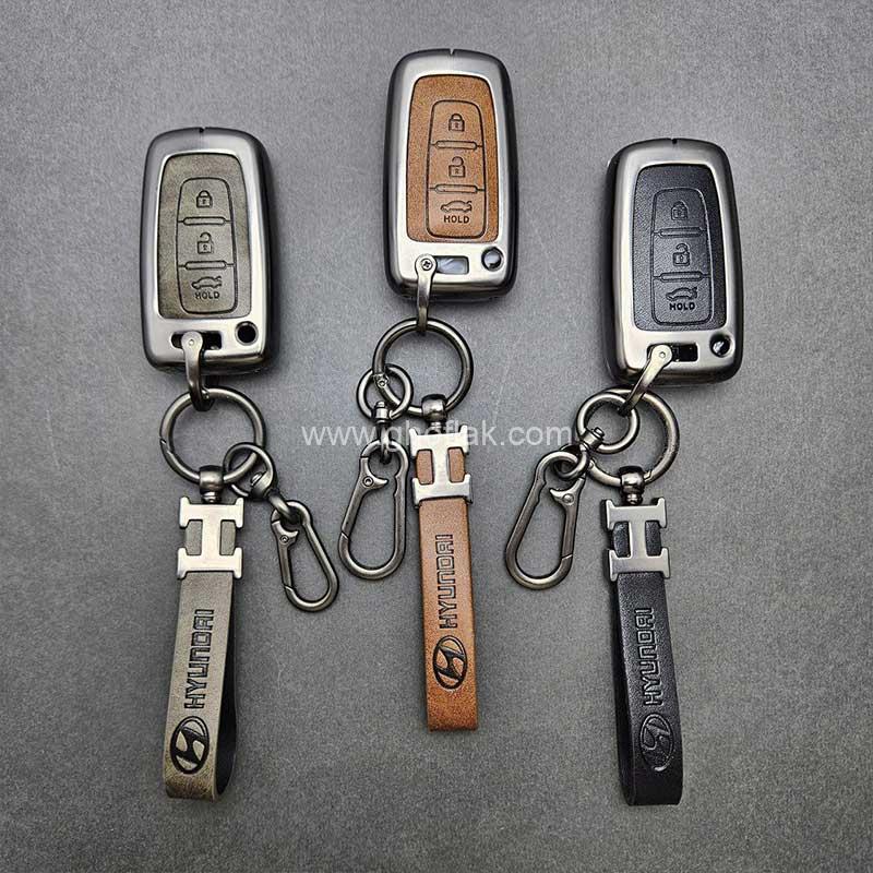 کاور-ریموت-هیوندایی-و-کیا-سه-دکمه-دور-فلزی-وسط-چرم-اعلا-02 کاور ریموت هیوندایی و کیا سه دکمه دور فلزی وسط چرم اعلا - Image 1