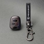 کاور ریموت پژو 206 و 207 و رانا و پارس مدل 96 به بالا طرح متالیک با بند ست پژو چرم