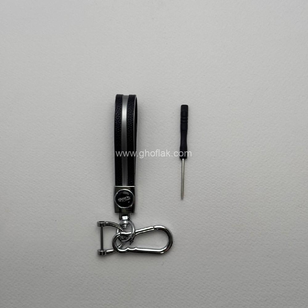 photo_2024-09-27_12-22-47 (2) آویز کلید پلاستیکی رنگ مات طرح چرم با نوار نقره ای - Image 1