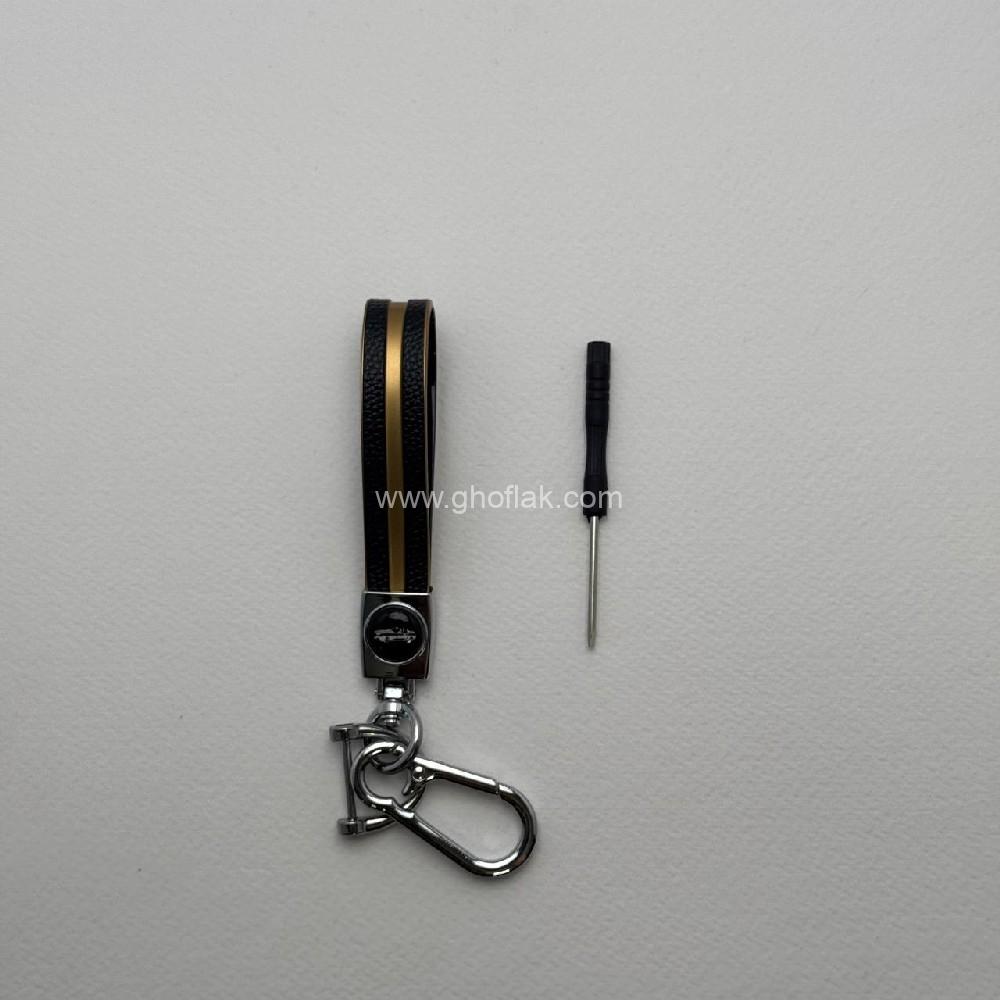 photo_2024-09-27_12-22-47 آویز کلید پلاستیکی رنگ مات طرح چرم با نوار طلایی - Image 1
