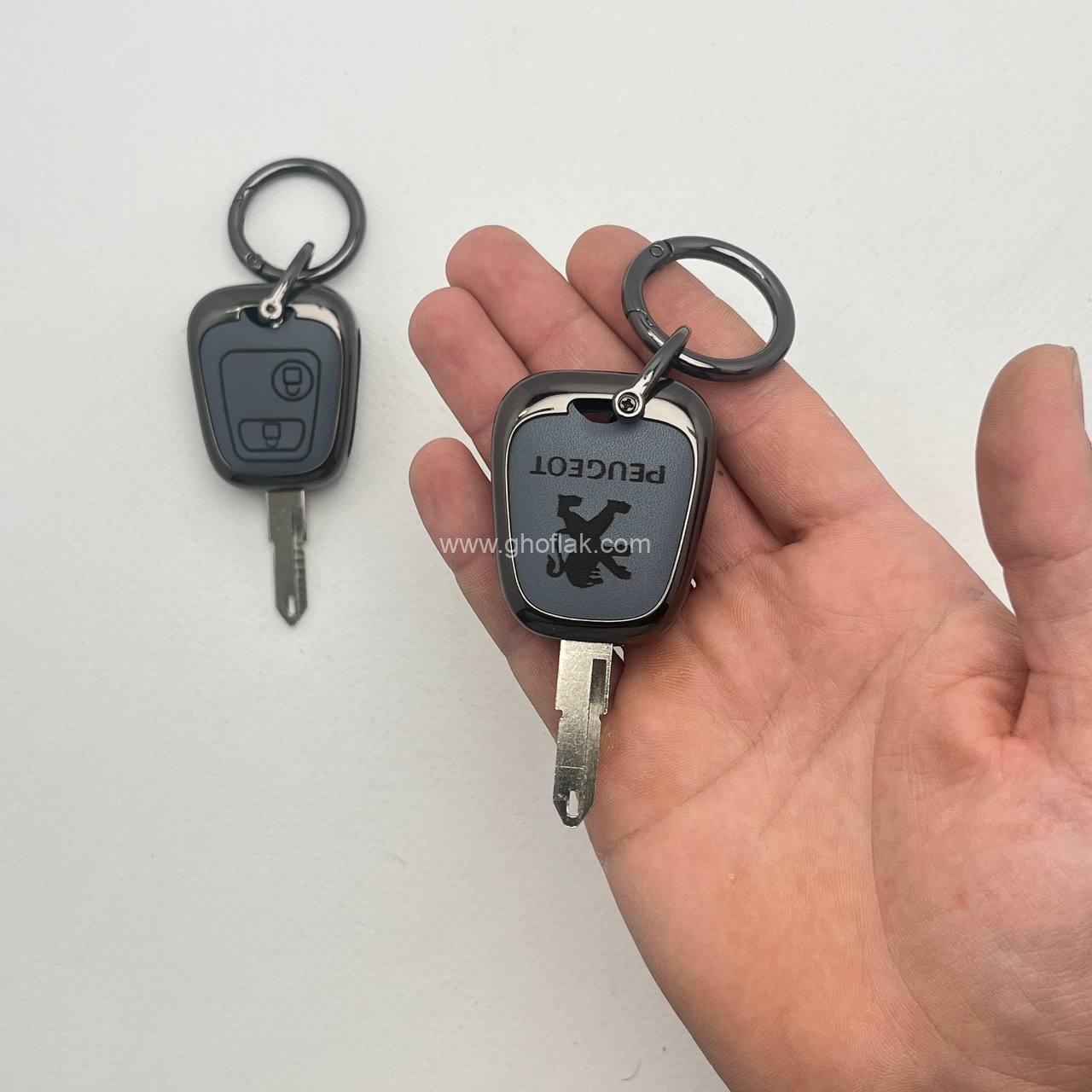 photo_3_2024-11-12_06-46-33 کاور ریموت پژو 206 - 207 - پارس مدل بالا و رانا دور فلزی وسط چرم بدون بند - Image 1