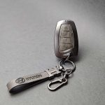 کاور ریموت هیوندایی گرنجور - سانتافه و سنتنیال کیلس چهار دکمه طرح دورفلزی وسط چرم اعلا - Image 15