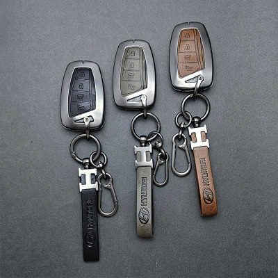 کاور ریموت هیوندایی گرنجور - سانتافه و سنتنیال کیلس چهار دکمه طرح دورفلزی وسط چرم اعلا