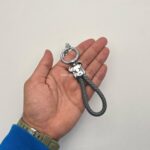 آویز چرم طرح کاز یراق نقره ای - Image 2