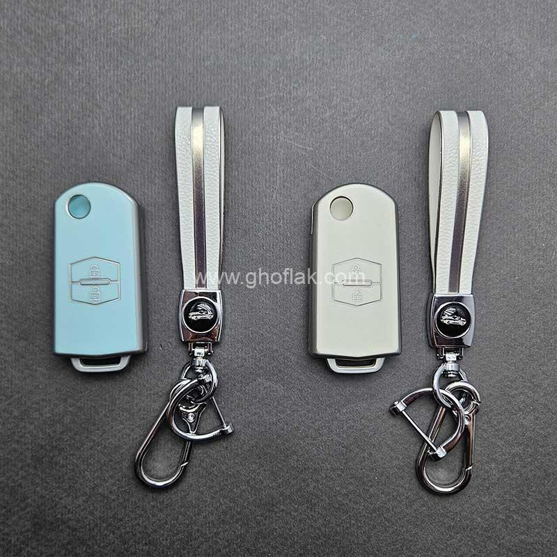 کاور-ریموت-مزدا-3-کلید-تاشو-طرح-چرم-با-بند-ست-01 کاور ریموت مزدا 3 کلید تاشو طرح چرم با بند ست - Image 1