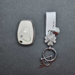 کاور ریموت ال نود و ساندرو طرح چرم با بند ست نگین دار - Image 3