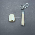 کاور ریموت پژو 206 و 207 و رانا و پارس مدل 96 به بالا طرح چرم با بند ست - Image 2