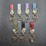 آویز چرم نگین دار یراق طلایی