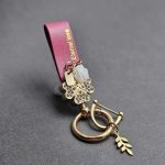 آویز چرم نگین دار یراق طلایی - Image 11