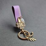 آویز چرم نگین دار یراق طلایی - Image 16