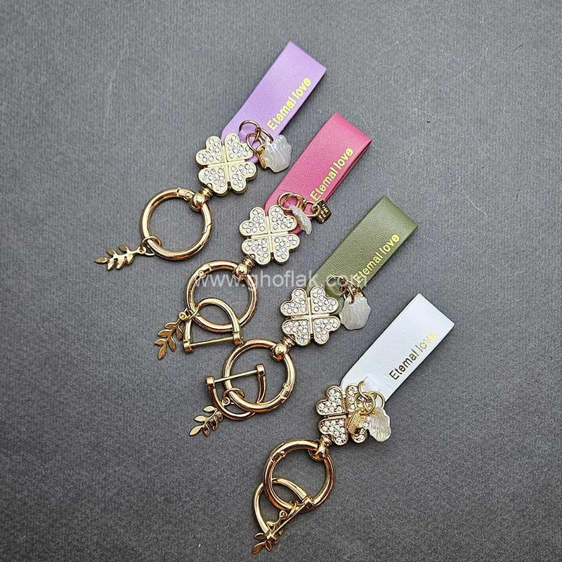 بند-نگیندار-با-یراق-طلایی آویز چرم نگین دار یراق طلایی - Image 1