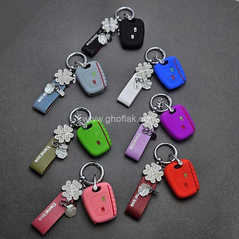 کاور-ریموت-پژو-206---207---پارس-مدل-بالا-و-رانا-سیلیکونی-با-بند-نگین-دار-01 کاور ریموت پژو 206 - 207 - پارس مدل بالا و رانا سیلیکونی با بند نگین دار - Image 1