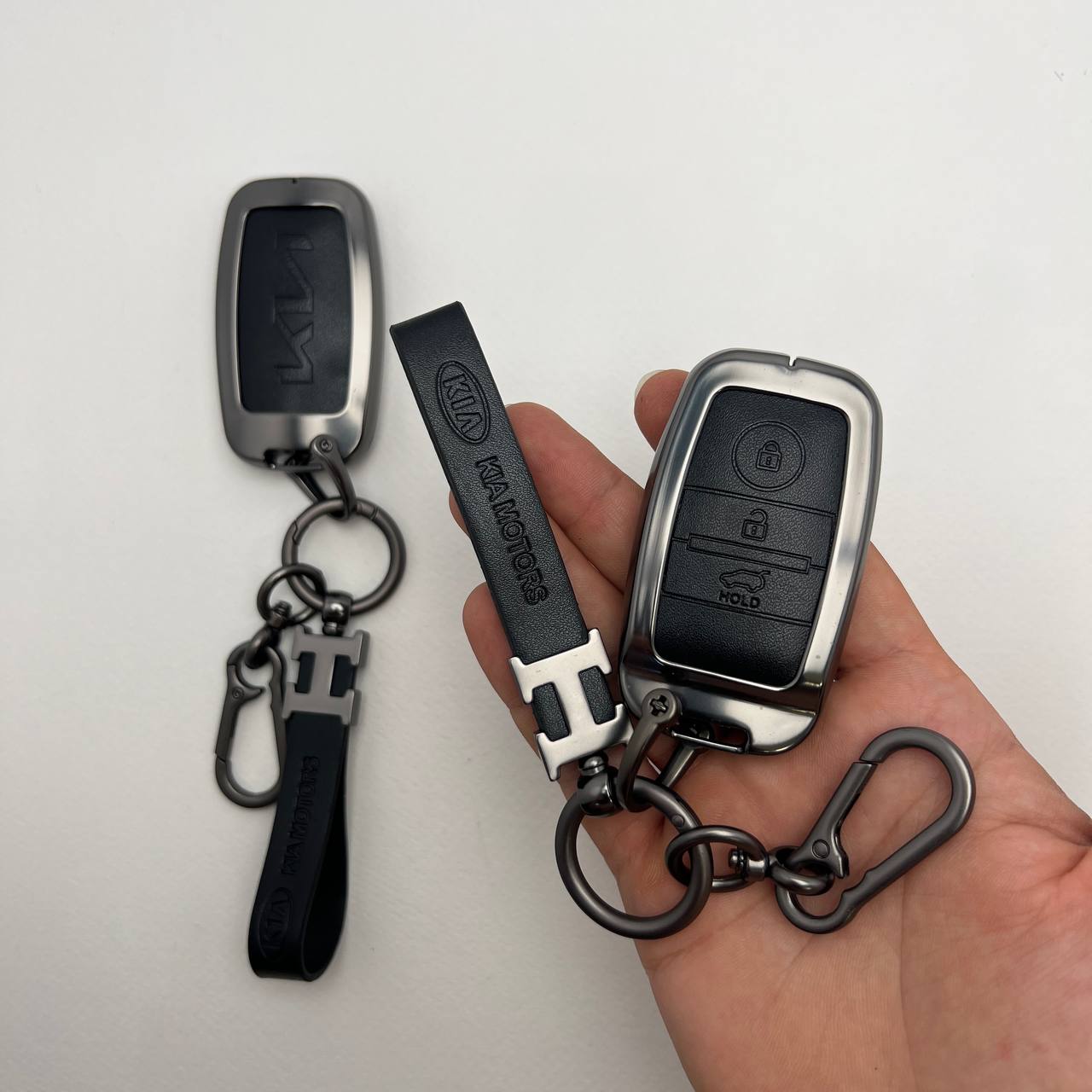 photo_13_2025-04-07_14-47-59 کاور ریموت کیا کیلس اپتیما - اسپرتیج - کادنزا - سورنتو دور فلزی وسط چرم - Image 1