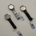 ساعت مچی طرح UNIQE با بند استیل