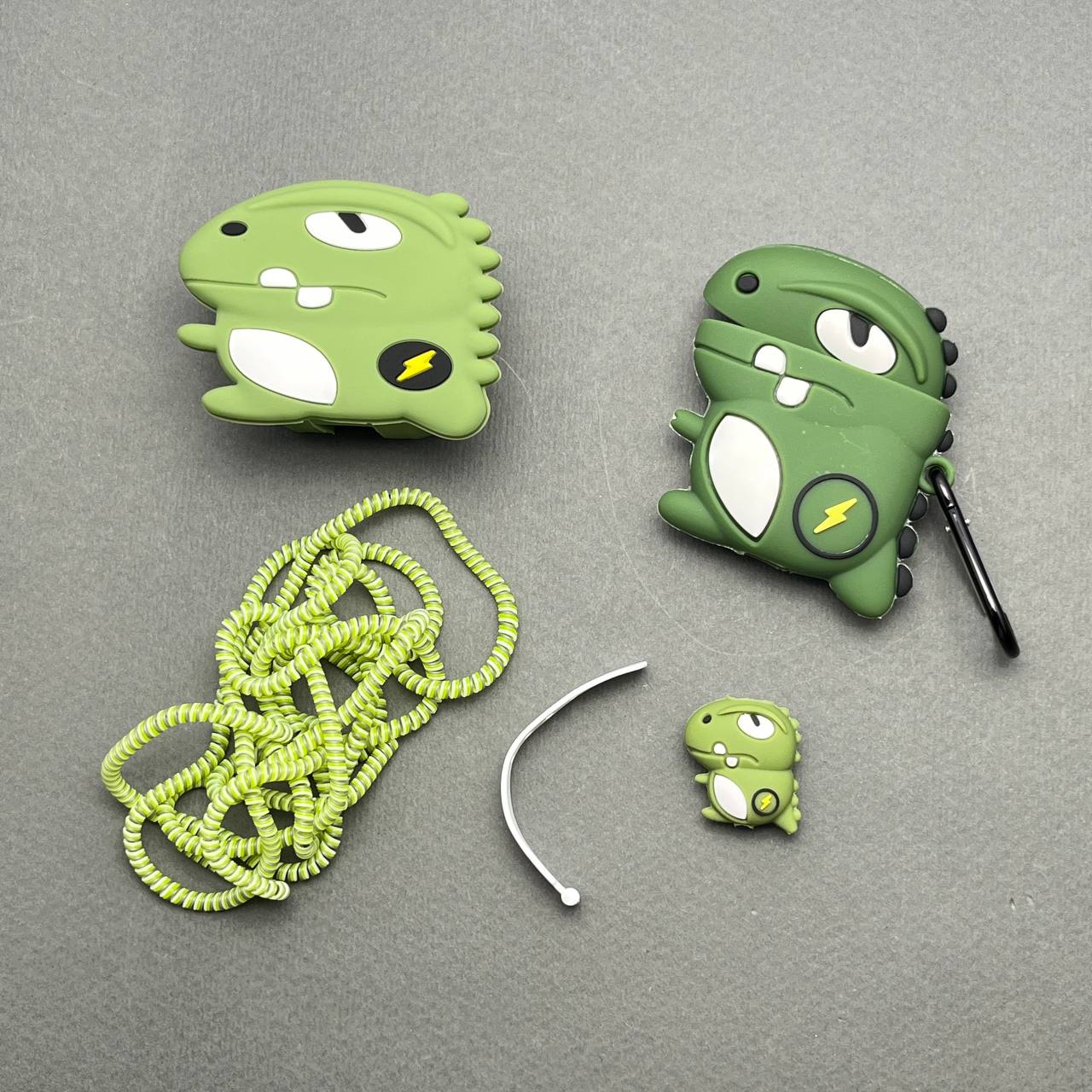 photo_14_2025-05-17_10-21-39 کاور شارژر و کاور ایرپاد طرح دایناسور - Image 1