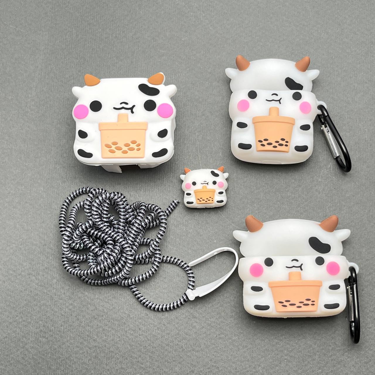 photo_5_2025-05-17_10-21-39 کاور شارژر و کاور ایرپاد طرح گاو - Image 1