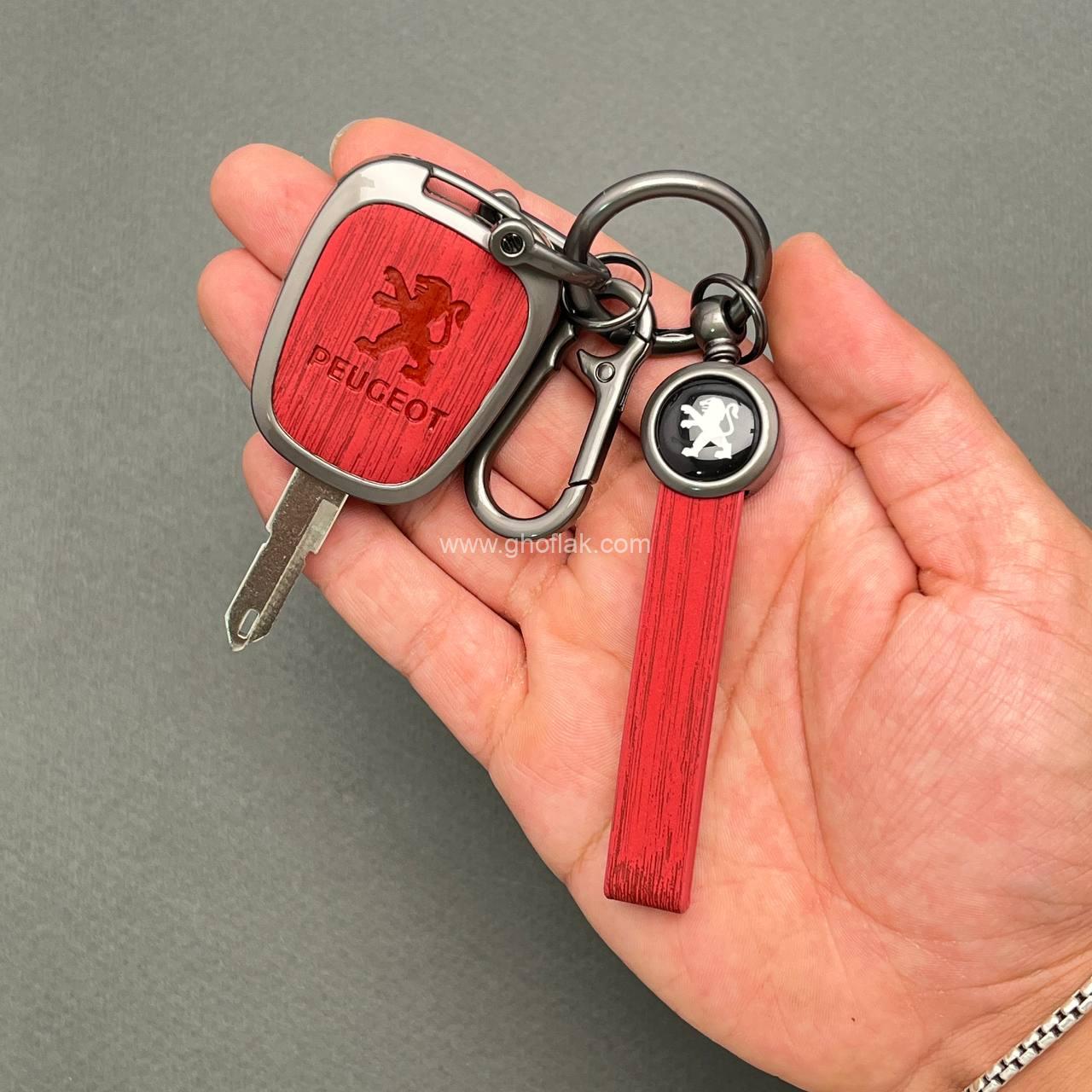 photo_2_2025-06-12_17-53-40 کاور ریموت پژو 206 و 207 و پارس مدل بالا دور فلزی طرح چرم و چوب - Image 1