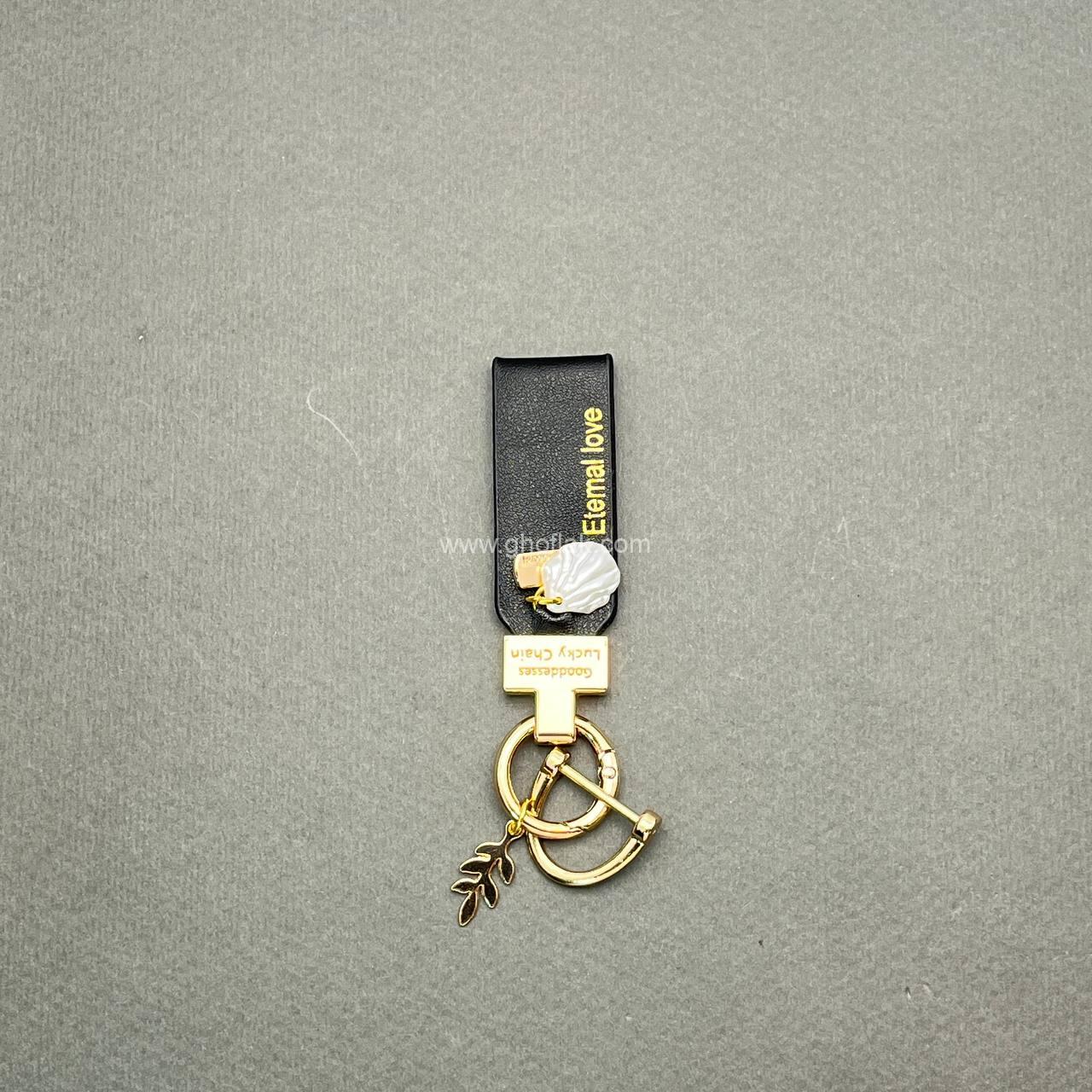 photo_6_2025-06-12_18-02-57 آویز چرم صدف دار - Image 1