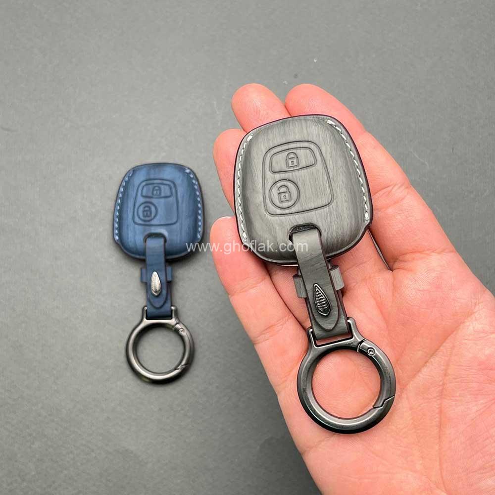 206-1 کاور ریموت پژو 206 و 207 و رانا و پارس مدل بالا طرح چرمی وودی - Image 1