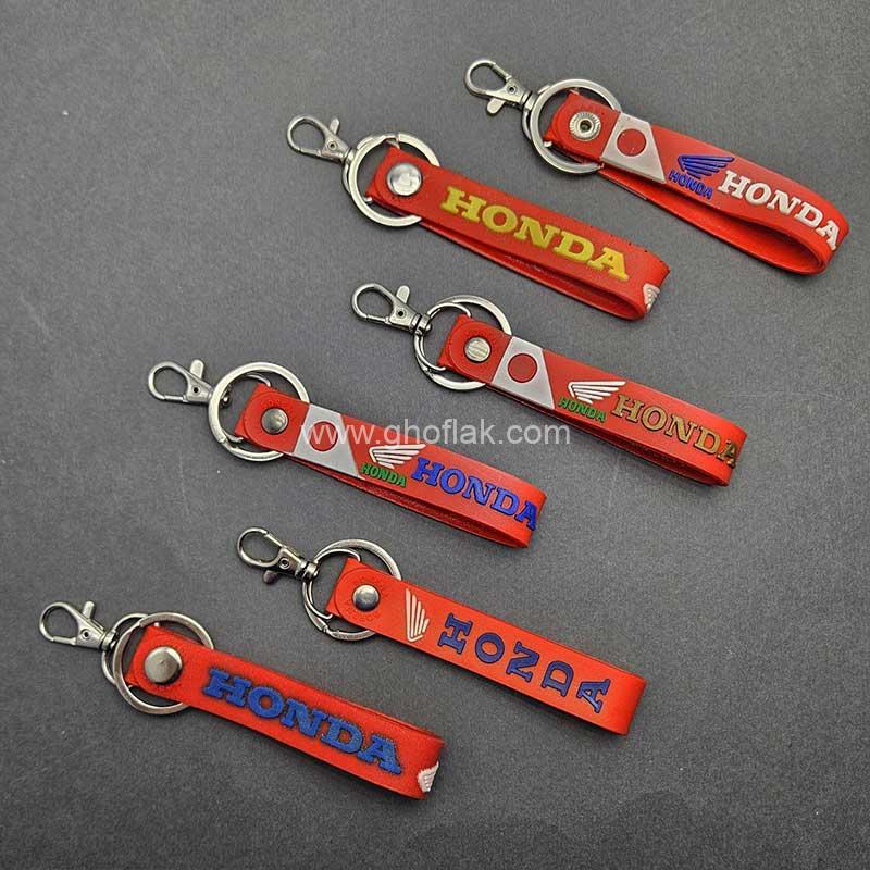 آویز-موتور-هوندا-پرچمی-سیلیکونی-قرمز-07 آویز موتور هوندا پرچمی سیلیکونی قرمز - Image 1