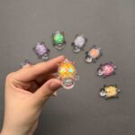 عروسک شب تاب لاکپشت پولک دار - Image 4