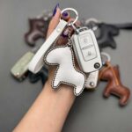 کاور ریموت پژو 405 و پارس دو دکمه ست فانتزی با چرم طبیعی