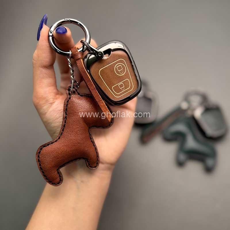 206-فلزی-وسط-چرم-با-بند-گاوی-002 کاور ریموت پژو 206 - 207 - رانا و پارس مدل بالا دور فلزی وسط چرم با بند فانتزی - Image 1