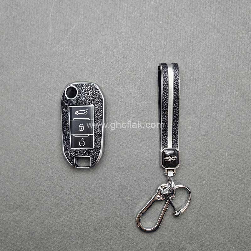 تارا-تاشو-طرح-چرم کاور ریموت تارا دنده ای کلید تاشو طرح چرم با بند ست - Image 1