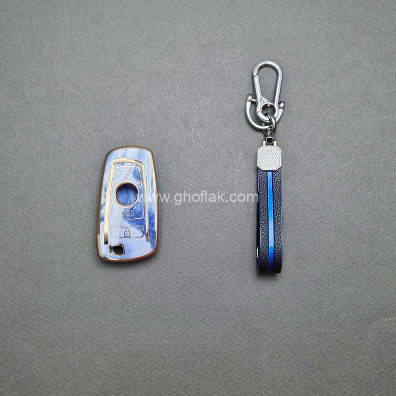 کوییک-مشترک-بی-ام-و-تاشو-007 کاور ریموت بی ام و مشترک با کوییک کلید تاشو طرح سرامیکی با بند ست - Image 1