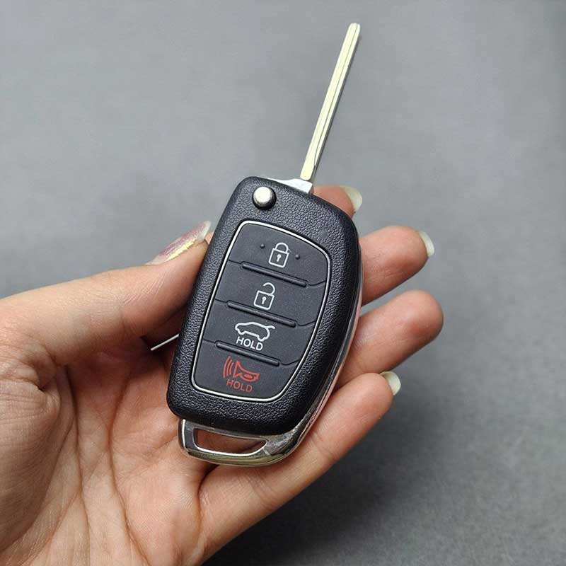 قاب-ریموت-هیوندایی-کلید-تاشو-چهار-دکمه-با-تیغه-شیار-ماری01 قاب ریموت هیوندایی کلید تاشو چهار دکمه با تیغه شیار ماری - Image 1