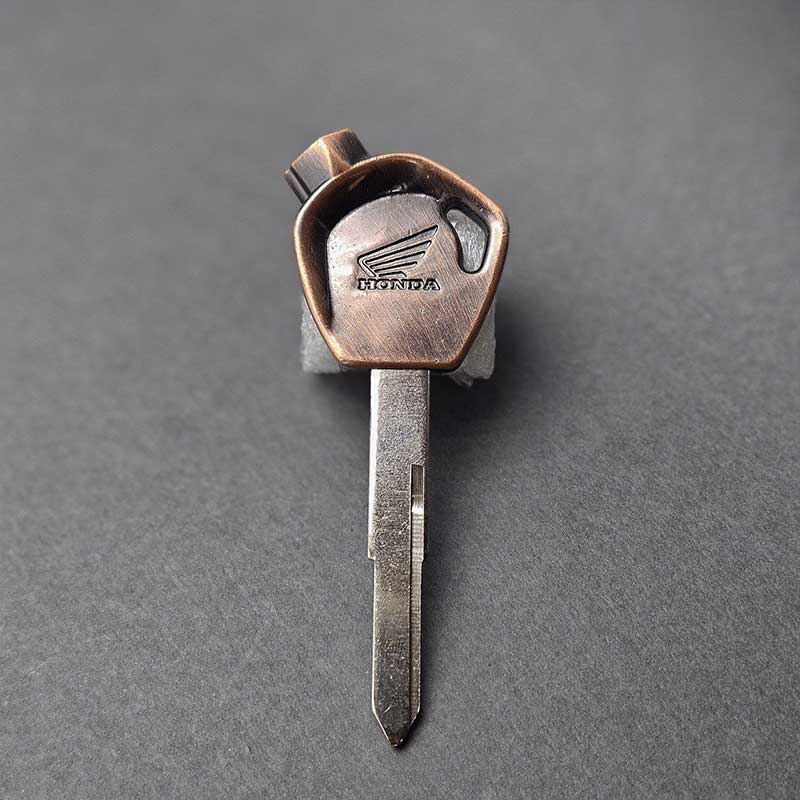 کلید-خام-هوندا-مگنت-دار-دسته-برنز-شیار-چپ-02 کلید خام هوندا مگنت دار دسته برنز شیار چپ - Image 1