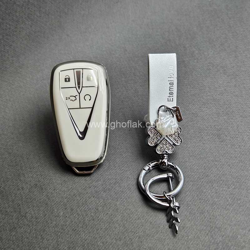 کاور-ریموت-چانگان-کیلس-چهار-دکمه-براق-با-بند-ست-نگین-دار-01 کاور ریموت چانگان کیلس چهار دکمه براق با بند ست نگین دار - Image 1