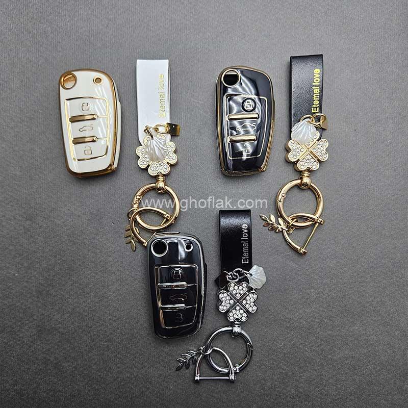 کاور-ریموت-چری-ام-وی-ام-ایکس22-ایکس33-و-جک-جی-4-تاشو-براق-با-بند-ست-نگین-دار کاور ریموت چری ام وی ام ایکس22 ایکس33 و جک جی 4 تاشو براق با بند ست نگین دار - Image 1