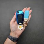 کاور ریموت تارا دنده قدیم شفاف با بند چرم گلدار