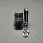 کاور ریموت تویوتا کرولا – لوین – هایلوکس – C-HR و RAV4 هیبریدی ۴ دکمه طرح چرم با بند